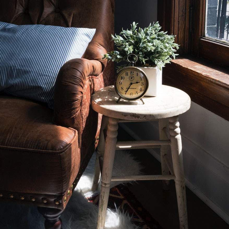 Photo of a side table next to a sofa